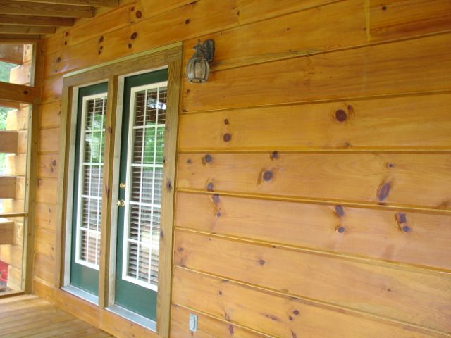 Wood siding looks most natural with a deep penetrating stain.